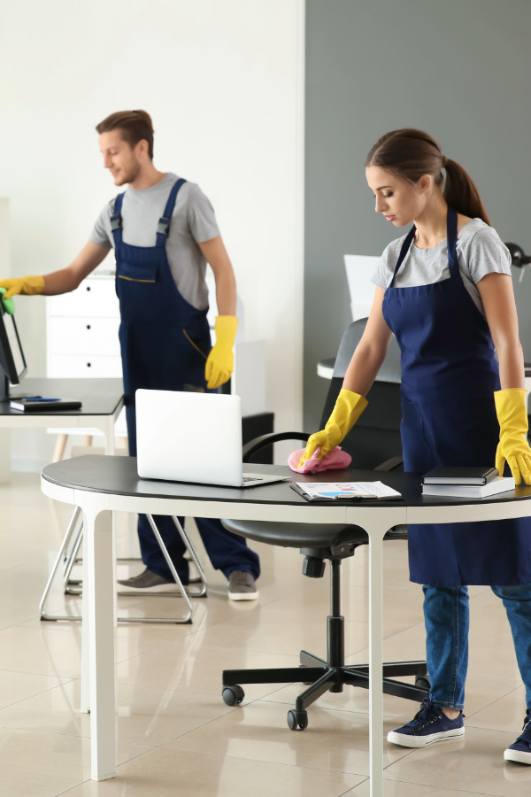 Commercial Cleaning Professional cleaner cleaning a commercial office