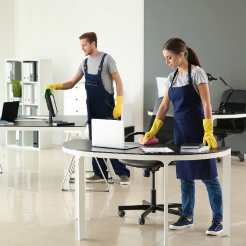 commercial-cleaning-services Professional cleaner cleaning a commercial office