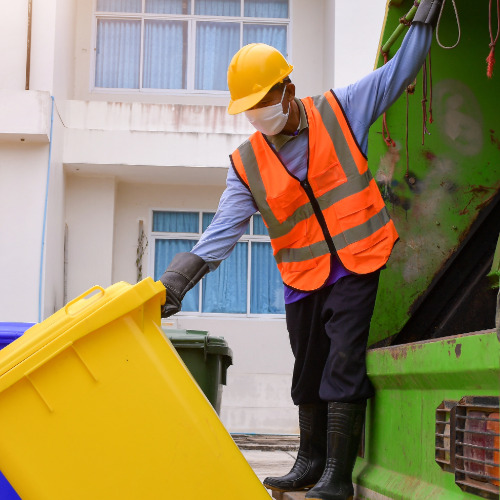 rubbish-junk-removal-services Professional cleaner providing carpet cleaning in a home
